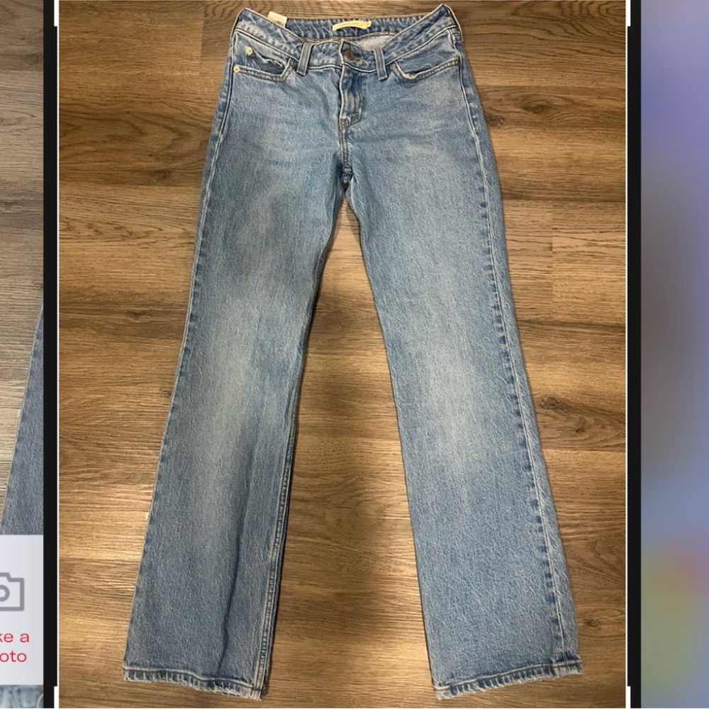 Levis Low pitch bootcut blue jeans W25 L31